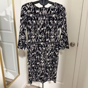 Calvin Klein | Elegant Black and White Patterned Dress with Bell Sleeves